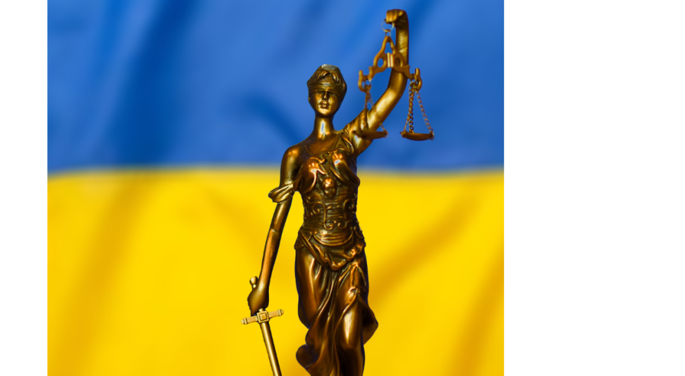 Ukraine flag and justice symbol statue 