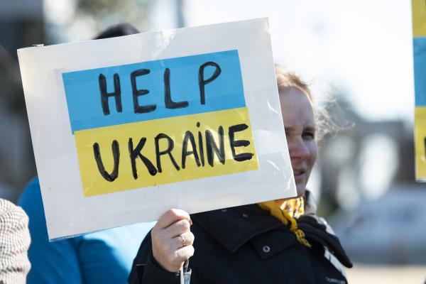 Help Ukraine poster during demonstation